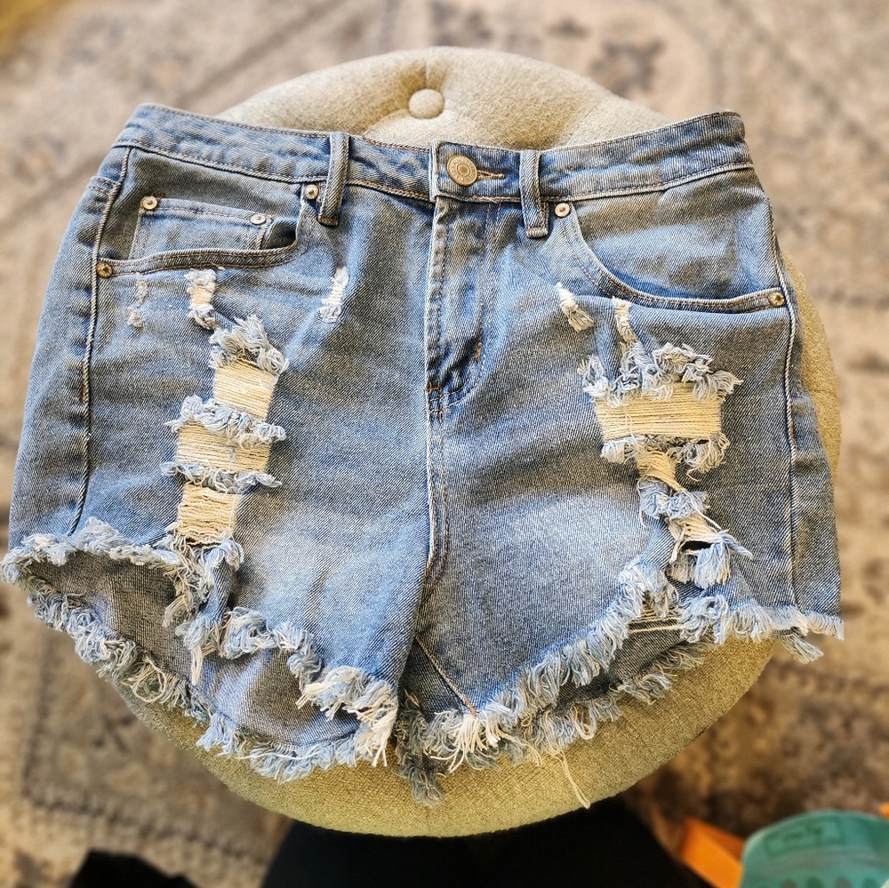 Light washed distressed jean shorts